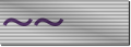 A horizontal rectangle ribbon similar to those issued in the military. It is colored and shaded to appear silver, with two purple tilde symbols on its left half, implying two more missing from the right.